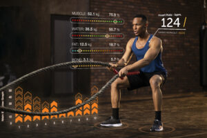 Man engaged in functional fitness with interactive data stats displayed, representing a detailed workout plan for men.